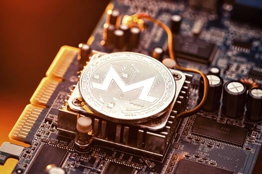 Monero coin sitting on a CPU